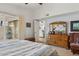 Spacious bedroom with outdoor access, dresser, and plenty of natural light at 2910 E Avenida Olivos --, Phoenix, AZ 85016