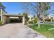 Charming single level home with carport, mature trees, and lush landscaping at 2910 E Avenida Olivos --, Phoenix, AZ 85016