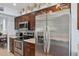 Modern kitchen with stainless steel appliances, sleek countertops, and ample cabinet space for storage at 2910 E Avenida Olivos --, Phoenix, AZ 85016