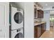 Laundry area and cabinets offering storage and convenience at 2910 E Avenida Olivos --, Phoenix, AZ 85016