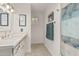 Clean and modern bathroom features a quartz countertop, patterned tile flooring, and new fixtures at 3016 N 49Th St, Phoenix, AZ 85018