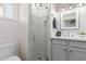 Bright bathroom with a glass-enclosed shower, modern fixtures, and stylish tile accents at 3016 N 49Th St, Phoenix, AZ 85018