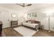 Comfortable bedroom featuring a stylish daybed, ceiling fan, and wood-look flooring at 3016 N 49Th St, Phoenix, AZ 85018