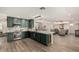 Open-concept kitchen with stainless appliances, light countertops, and wine fridge at 3016 N 49Th St, Phoenix, AZ 85018