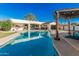 Backyard pool, pergola, and updated exterior of home with a covered patio and garage at 3016 N 49Th St, Phoenix, AZ 85018