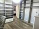 Spacious walk-in closet with custom shelving, drawers, and ample storage space at 3016 N 49Th St, Phoenix, AZ 85018