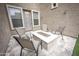Backyard patio offers a great outdoor space featuring a stone firepit and seating at 35317 N 31St Dr, Phoenix, AZ 85086