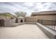 Backyard featuring a stucco fireplace with built-in seating perfect for outdoor gatherings at 35317 N 31St Dr, Phoenix, AZ 85086