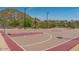 Outdoor basketball court featuring a hoop, desert landscape and ample space for play and recreation at 35317 N 31St Dr, Phoenix, AZ 85086