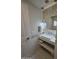 Bathroom featuring a floating vanity, stylish pendant lights, and modern fixtures at 35317 N 31St Dr, Phoenix, AZ 85086