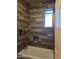 Bathroom featuring a bathtub and tiled shower with built-in shelves at 35317 N 31St Dr, Phoenix, AZ 85086