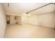 Bright and spacious two car garage with epoxy floors and white walls at 35317 N 31St Dr, Phoenix, AZ 85086