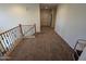 Upstairs hallway with carpet and neutral paint colors at 35317 N 31St Dr, Phoenix, AZ 85086