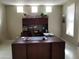 Bright office space featuring large desk, built-in shelves, and natural light at 35317 N 31St Dr, Phoenix, AZ 85086