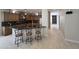 Well-appointed kitchen with granite countertops, stainless steel appliances, and a breakfast bar with seating at 35317 N 31St Dr, Phoenix, AZ 85086