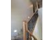 A carpeted staircase with decorative wrought iron railing leads to the second floor at 35317 N 31St Dr, Phoenix, AZ 85086