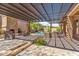 Luxurious backyard patio with a pergola, outdoor fireplace, and built-in grill, perfect for entertaining at 41624 N Anthem Ridge Dr, Anthem, AZ 85086