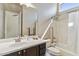 Well-lit bathroom features a bathtub and shower combo with updated fixtures and hardware at 41624 N Anthem Ridge Dr, Anthem, AZ 85086