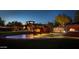 Beautiful entrance to Anthem Country Club featuring a water feature and illuminated signage at 41624 N Anthem Ridge Dr, Anthem, AZ 85086