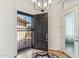 Inviting foyer with a decorative tile floor and open view to the front exterior at 41624 N Anthem Ridge Dr, Anthem, AZ 85086