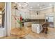 Bright, well-lit kitchen with granite countertops, stainless steel appliances, and ample cabinet space at 41624 N Anthem Ridge Dr, Anthem, AZ 85086