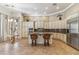 Well-lit kitchen with a large island, granite countertops, stainless steel appliances and modern cabinets at 41624 N Anthem Ridge Dr, Anthem, AZ 85086