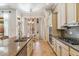 Spacious kitchen with a granite island, stainless steel appliances, and ample cabinet space at 41624 N Anthem Ridge Dr, Anthem, AZ 85086