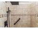 The new shower with an adjustable showerhead and designer-tiled walls at 41624 N Anthem Ridge Dr, Anthem, AZ 85086