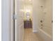 Bathroom with tiled floor, vanity with granite countertop, and a shower-tub combo at 4241 N Pebble Creek Pkwy # 54, Goodyear, AZ 85395