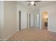Bright bedroom features wood-look floors, double closets and neutral walls at 4241 N Pebble Creek Pkwy # 54, Goodyear, AZ 85395