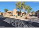 Well-maintained community featuring charming single-story homes and manicured landscaping at 4241 N Pebble Creek Pkwy # 54, Goodyear, AZ 85395