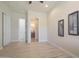 Bedroom features wood-look floors and an en-suite bath at 4241 N Pebble Creek Pkwy # 54, Goodyear, AZ 85395