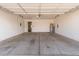 The garage has concrete floors and a water heater at 4245 E Jason Dr, Phoenix, AZ 85050