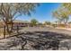 Gated community entrance with lush greenery, offering a secure and private living environment for residents at 4919 E Morning Vista Ln, Cave Creek, AZ 85331