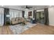 Comfortable living room featuring stylish decor, large windows, and sliding glass door at 5209 N 24Th St # 104, Phoenix, AZ 85016