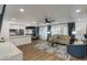 Spacious living room with ample natural light, modern decor, and open floor plan at 5209 N 24Th St # 104, Phoenix, AZ 85016
