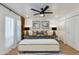 Comfortable bedroom featuring modern decor, a ceiling fan, and neutral finishes at 5209 N 24Th St # 104, Phoenix, AZ 85016