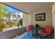 Cozy outdoor patio with seating area and views of landscaped grounds at 5209 N 24Th St # 104, Phoenix, AZ 85016
