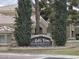 Bella Terra Condominiums sign at Paradise Valley with mature landscaping and a view of the property behind the sign at 5335 E Shea Blvd # 1035, Scottsdale, AZ 85254