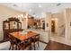 Charming dining area adjacent to the kitchen features a wooden table and antique furnishings at 5370 S Desert Dawn Dr # 50, Gold Canyon, AZ 85118