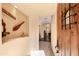 Inviting foyer with tiled floors, decorative niche and wooden door at 5370 S Desert Dawn Dr # 50, Gold Canyon, AZ 85118