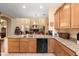Open kitchen with a granite countertop island overlooking the spacious living area, great for entertaining at 5370 S Desert Dawn Dr # 50, Gold Canyon, AZ 85118