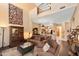 Spacious living room showcases high ceilings and an open floor plan with elegant furnishings and decor at 5370 S Desert Dawn Dr # 50, Gold Canyon, AZ 85118