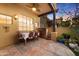 Charming outdoor patio dining space with seating for four at 5370 S Desert Dawn Dr # 50, Gold Canyon, AZ 85118