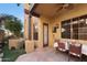 Covered patio with stylish seating and an outdoor table, perfect for entertaining at 5370 S Desert Dawn Dr # 50, Gold Canyon, AZ 85118