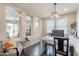 Bright and airy office space featuring custom built-ins, a modern desk, and stylish decor at 623 E Peach Tree St, Queen Creek, AZ 85140