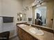 Bathroom includes dual sinks and an arched doorway at 650 N Hawes Rd # 4406, Mesa, AZ 85207