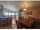 Dining room showcasing wood table and chairs adjacent to the kitchen area at 650 N Hawes Rd # 4406, Mesa, AZ 85207