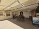 Spacious garage used as a multi-functional space with seating area and storage at 650 N Hawes Rd # 4406, Mesa, AZ 85207