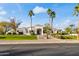 Inviting home with manicured landscaping, mature trees, and a charming front entrance with mature trees at 6700 E Caron Dr, Paradise Valley, AZ 85253